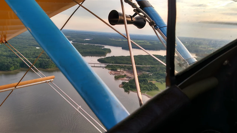 Illustration for article titled "Hold the stick, I got to snapchat this"....Let's fly a Biplane!
